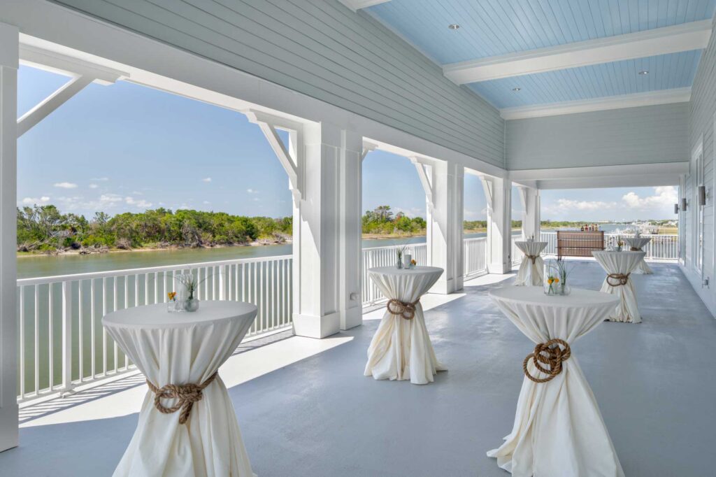 Outdoor Veranda with Tables set up and covered in white cloth